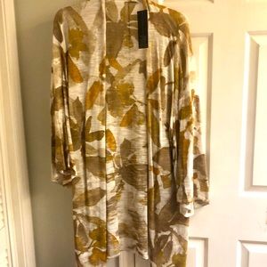 Women cover up long sleeve looks great with sweaters and boots